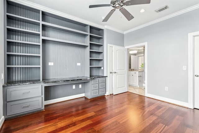 1419 Montrose Blvd Unit 301, Houston, TX 77019 - unfurnished bedroom featuring ornamental molding, wood finished floors, ensuite bath, and a ceiling fan