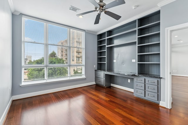 1419 Montrose Blvd Unit 301, Houston, TX 77019 - unfurnished office with crown molding, built in shelves, built in study area, dark wood finished floors, and ceiling fan