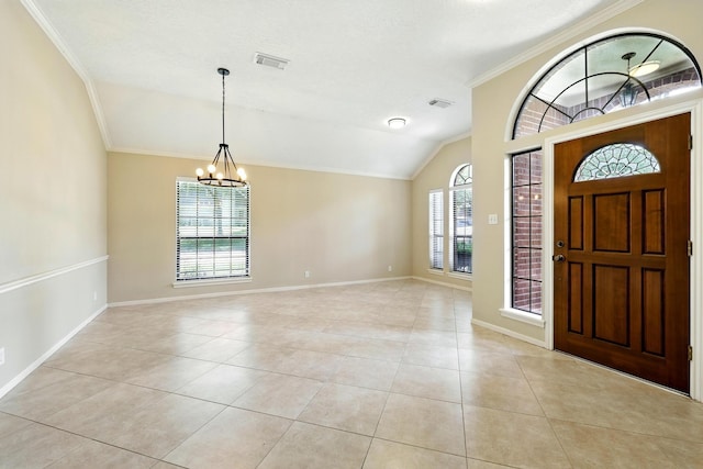 24806 Silver Leaf St, Magnolia, TX 77355 - entryway featuring a chandelier, lofted ceiling, light tile patterned flooring, and crown molding