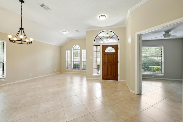 24806 Silver Leaf St, Magnolia, TX 77355 - foyer with crown molding, a chandelier, healthy amount of natural light, light tile patterned floors, and lofted ceiling