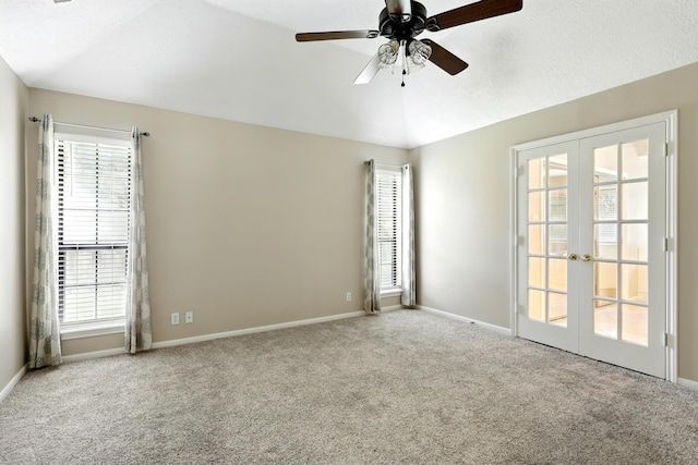 24806 Silver Leaf St, Magnolia, TX 77355 - carpeted empty room with french doors, ceiling fan, and vaulted ceiling