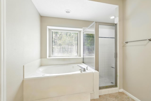 24806 Silver Leaf St, Magnolia, TX 77355 - full bath with a shower stall, a bath, and tile patterned floors