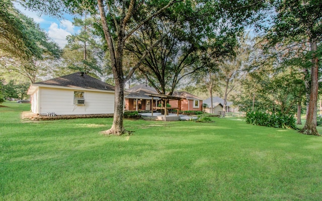 24806 Silver Leaf St, Magnolia, TX 77355 - view of grassy yard featuring a patio