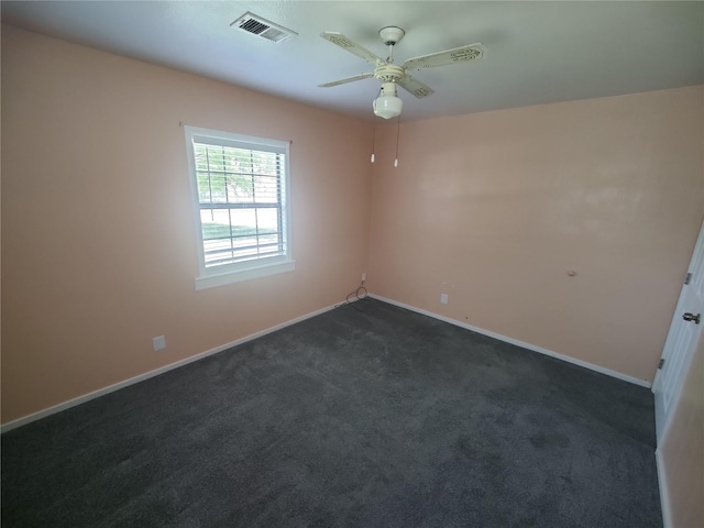 6714 Underhill St, Houston, TX 77092 - unfurnished room featuring a ceiling fan and dark carpet