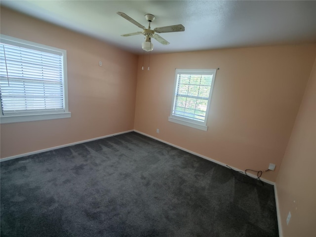 6714 Underhill St, Houston, TX 77092 - empty room featuring ceiling fan and dark colored carpet