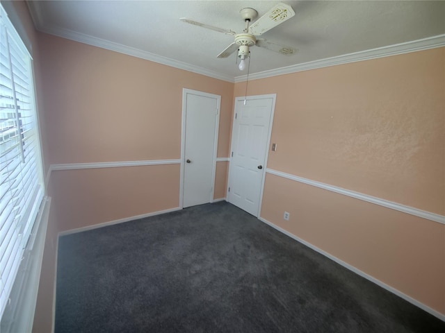 6714 Underhill St, Houston, TX 77092 - spare room featuring ceiling fan, dark carpet, and ornamental molding