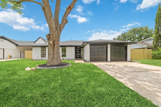 13019 Foxburo Dr, Houston, TX 77065 - mid-century home with concrete driveway and an attached garage