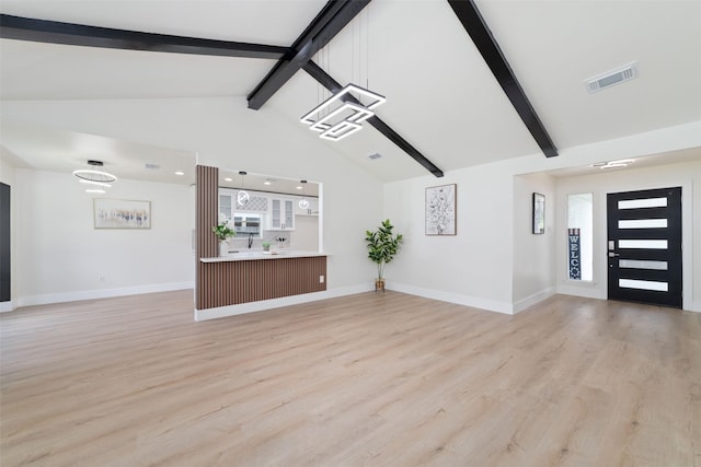 13019 Foxburo Dr, Houston, TX 77065 - unfurnished living room with beamed ceiling, light wood-style floors, and high vaulted ceiling