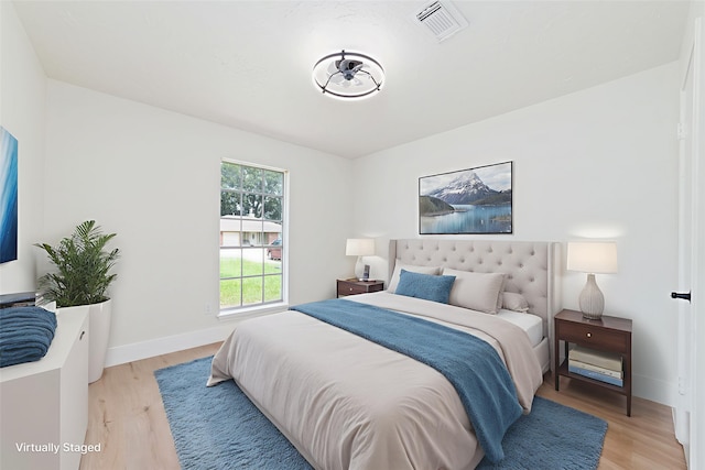 13019 Foxburo Dr, Houston, TX 77065 - bedroom featuring light wood-style flooring and baseboards