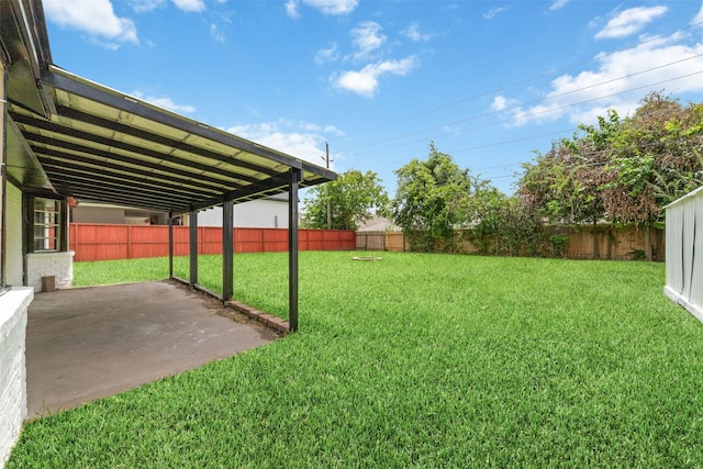 13019 Foxburo Dr, Houston, TX 77065 - fenced backyard with a patio area