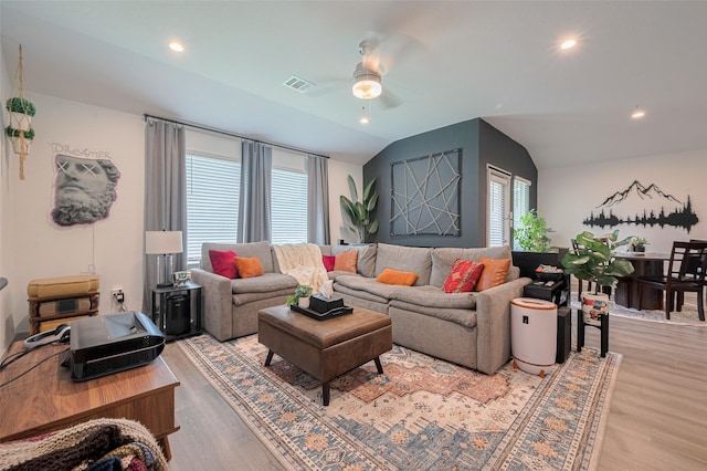 7822 Murciana Dr, Rosharon, TX 77583 - living room with ceiling fan, light wood finished floors, vaulted ceiling, healthy amount of natural light, and recessed lighting