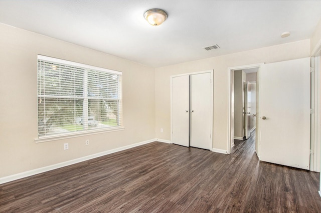 20515 Rustic Rail Ct, Cypress, TX 77433 - unfurnished bedroom featuring dark wood-style floors and a closet