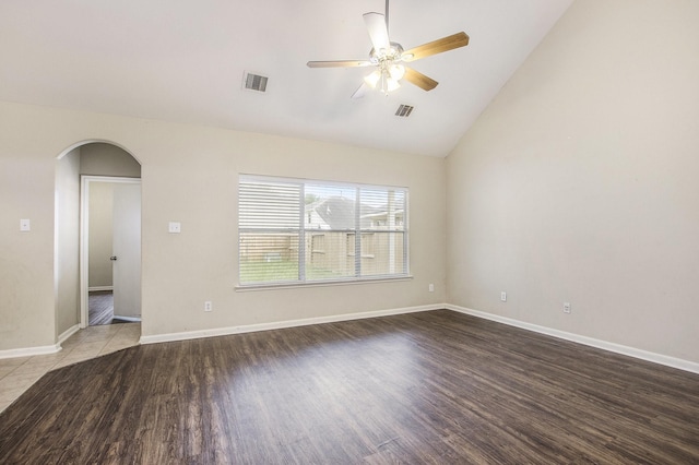 20515 Rustic Rail Ct, Cypress, TX 77433 - unfurnished room with arched walkways, a ceiling fan, vaulted ceiling, and wood finished floors