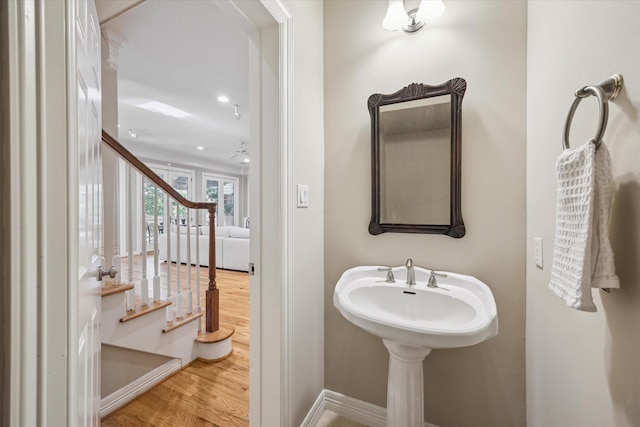 3614 University Blvd, West University Place, TX 77005 - bathroom with wood finished floors and ceiling fan
