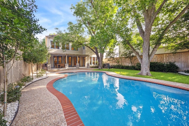 3614 University Blvd, West University Place, TX 77005 - view of swimming pool with a fenced backyard, a pool with connected hot tub, and a patio area