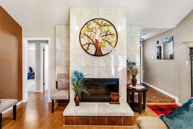 3426 Acorn Springs Ln, Spring, TX 77389 - living room featuring a textured ceiling and wood finished floors
