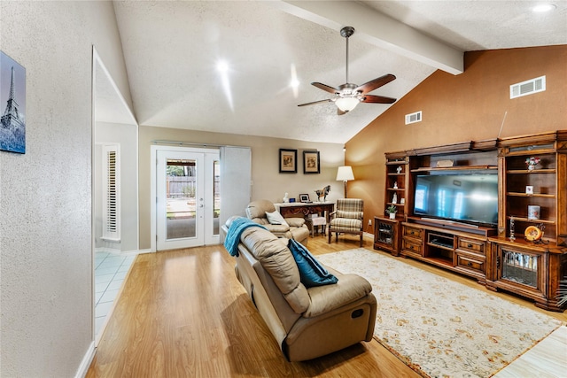 3426 Acorn Springs Ln, Spring, TX 77389 - living room featuring wood finished floors, ceiling fan, beam ceiling, and high vaulted ceiling