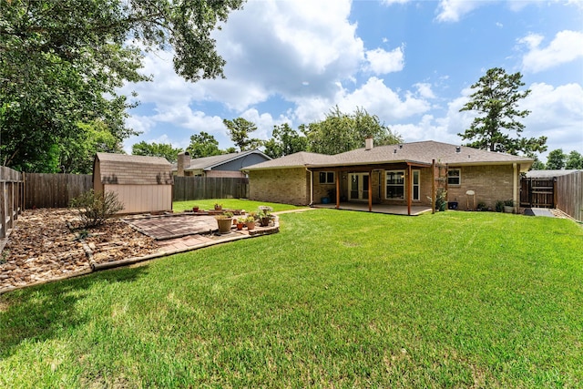 3426 Acorn Springs Ln, Spring, TX 77389 - back of property featuring a patio area, brick siding, a shed, and a fenced backyard