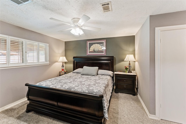 3426 Acorn Springs Ln, Spring, TX 77389 - carpeted bedroom featuring a ceiling fan and a textured ceiling