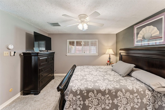 3426 Acorn Springs Ln, Spring, TX 77389 - carpeted bedroom featuring a textured ceiling and ceiling fan