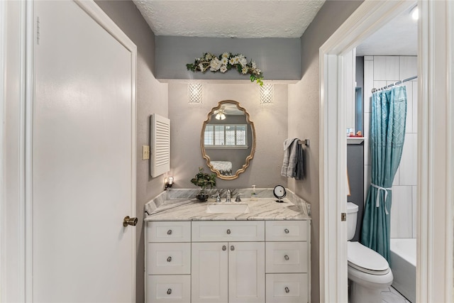 3426 Acorn Springs Ln, Spring, TX 77389 - full bathroom featuring vanity, a textured ceiling, and shower / bath combo with shower curtain