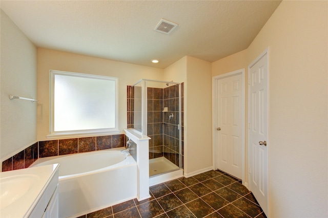 14839 Fir Knoll Way, Cypress, TX 77429 - bathroom featuring a garden tub, a shower stall, vanity, and tile patterned floors