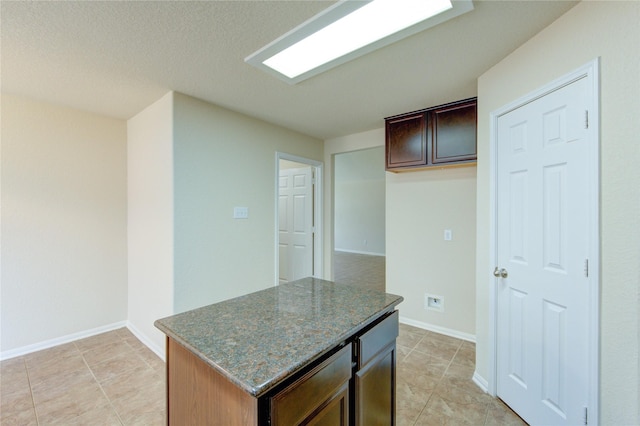 14839 Fir Knoll Way, Cypress, TX 77429 - kitchen with a center island and dark brown cabinetry