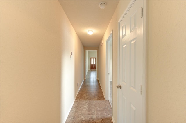 14839 Fir Knoll Way, Cypress, TX 77429 - hall with a textured wall and light stone finish floors