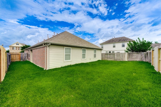 14839 Fir Knoll Way, Cypress, TX 77429 - rear view of property with a fenced backyard, roof with shingles, and brick siding