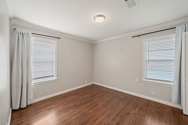 2111 Bron Holly Dr, Houston, TX 77018 - empty room featuring dark wood-style flooring and crown molding