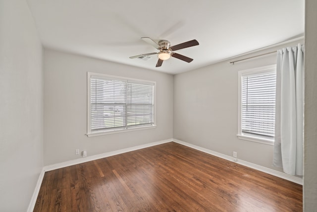 2111 Bron Holly Dr, Houston, TX 77018 - unfurnished room featuring ceiling fan and dark wood-style flooring