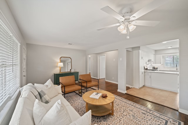 2111 Bron Holly Dr, Houston, TX 77018 - living room with light wood-style floors and a ceiling fan
