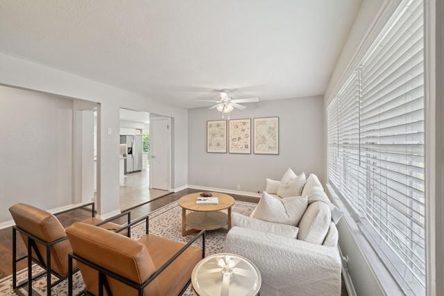 2111 Bron Holly Dr, Houston, TX 77018 - living room featuring a ceiling fan and wood finished floors