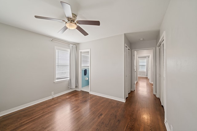 2111 Bron Holly Dr, Houston, TX 77018 - unfurnished bedroom featuring dark wood-style flooring and a ceiling fan