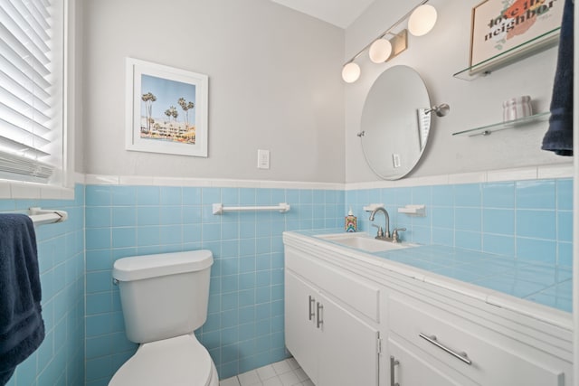 2111 Bron Holly Dr, Houston, TX 77018 - half bath with vanity, wainscoting, and tile walls