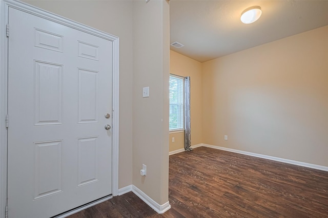 8134 Menorca Cove Dr, Cypress, TX 77433 - foyer entrance featuring dark wood-style flooring and baseboards