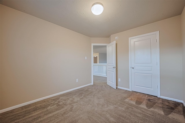 8134 Menorca Cove Dr, Cypress, TX 77433 - unfurnished bedroom with carpet flooring and baseboards