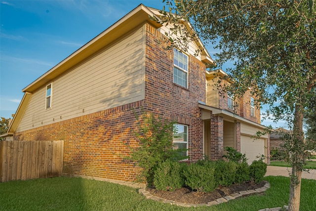 8134 Menorca Cove Dr, Cypress, TX 77433 - view of property exterior with brick siding and an attached garage