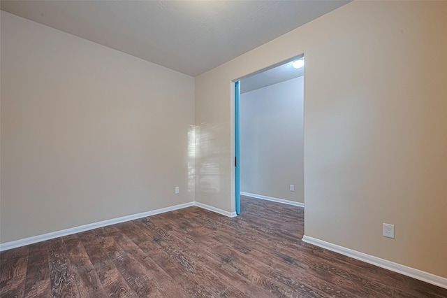 8134 Menorca Cove Dr, Cypress, TX 77433 - unfurnished room featuring dark wood-style floors and baseboards