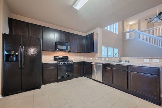 8134 Menorca Cove Dr, Cypress, TX 77433 - kitchen featuring black appliances, ceiling fan, decorative backsplash, dark brown cabinetry, and light tile patterned floors