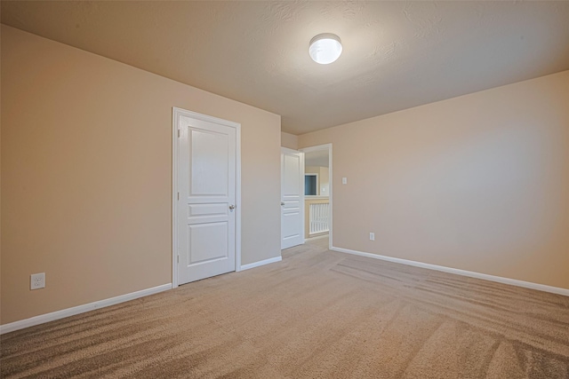 8134 Menorca Cove Dr, Cypress, TX 77433 - carpeted empty room with baseboards