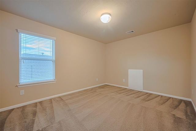 8134 Menorca Cove Dr, Cypress, TX 77433 - unfurnished room with light carpet