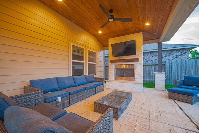 8134 Menorca Cove Dr, Cypress, TX 77433 - view of patio / terrace featuring an outdoor living space with a fireplace and a ceiling fan