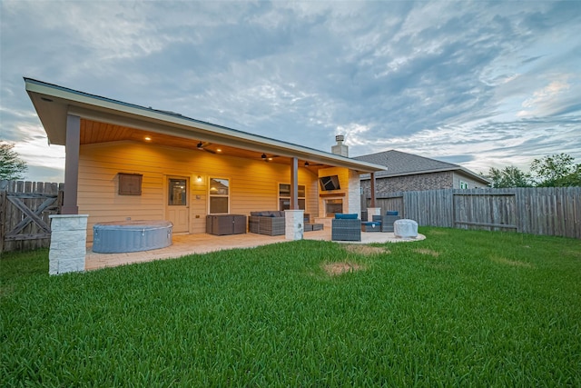 8134 Menorca Cove Dr, Cypress, TX 77433 - back of house featuring an outdoor hangout area, a patio, and a fenced backyard