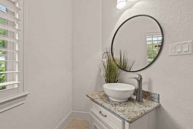 32723 Westminster Dr, Fulshear, TX 77441 - bathroom with vanity and baseboards