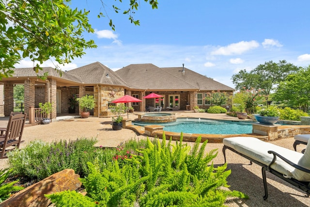 32723 Westminster Dr, Fulshear, TX 77441 - view of swimming pool with a patio and a pool with connected hot tub