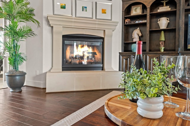 32723 Westminster Dr, Fulshear, TX 77441 - detailed view of wood finished floors and a glass covered fireplace