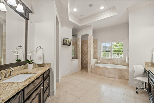32723 Westminster Dr, Fulshear, TX 77441 - bathroom featuring vanity, a bath, tile patterned floors, a tray ceiling, and ornamental molding