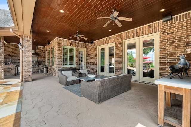 32723 Westminster Dr, Fulshear, TX 77441 - view of patio featuring french doors, a ceiling fan, and outdoor lounge area