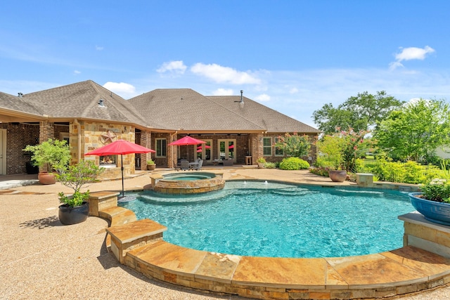 32723 Westminster Dr, Fulshear, TX 77441 - view of pool with a patio area and a pool with connected hot tub